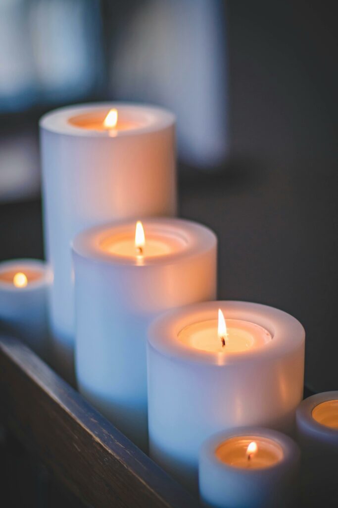 A close-up of a serene candlelight arrangement with a soft, soothing glow.